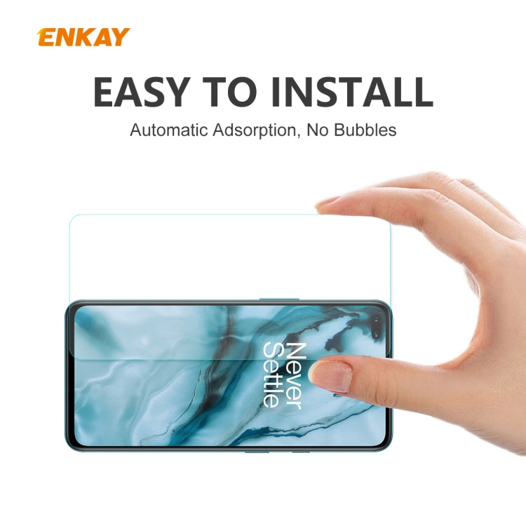 Smartphone screen protector being applied by hand; tempered glass film with curved edges