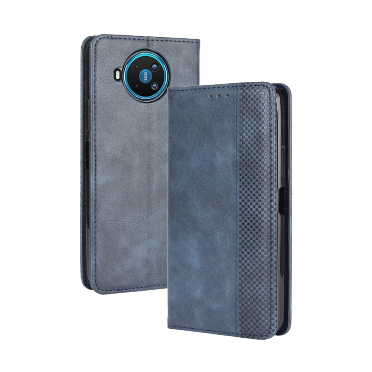 Blue leather flip phone case with camera cutout and textured side panel.
