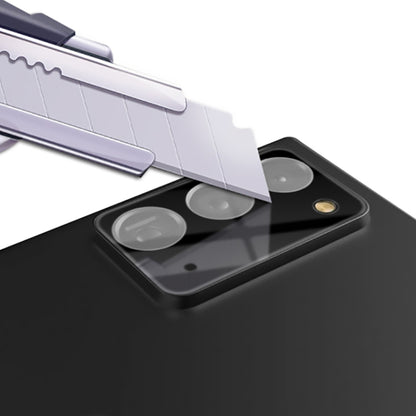 camera lens tempered glass film aligning over three lenses on phone back