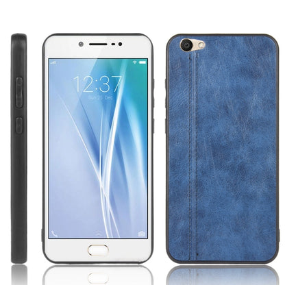 Blue faux leather phone case with stitched edge, camera cutout, and raised bezel