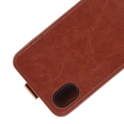 Brown leather phone case with stitched edges and camera cutout
