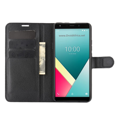 WIKO Y61 black flip wallet case with phone installed and card slots inside