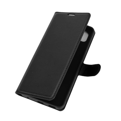 Black flip phone wallet case with folio cover and cutout for buttons