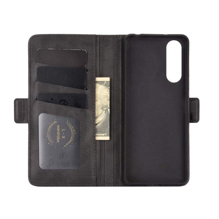 Black leather flip wallet case with card slots and magnetic closure, phone backing visible