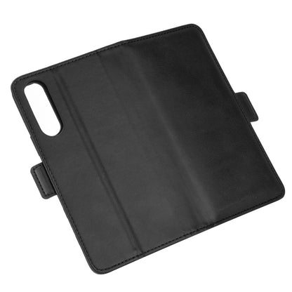 Black leather folio flip case with phone camera cutout and button-side strap