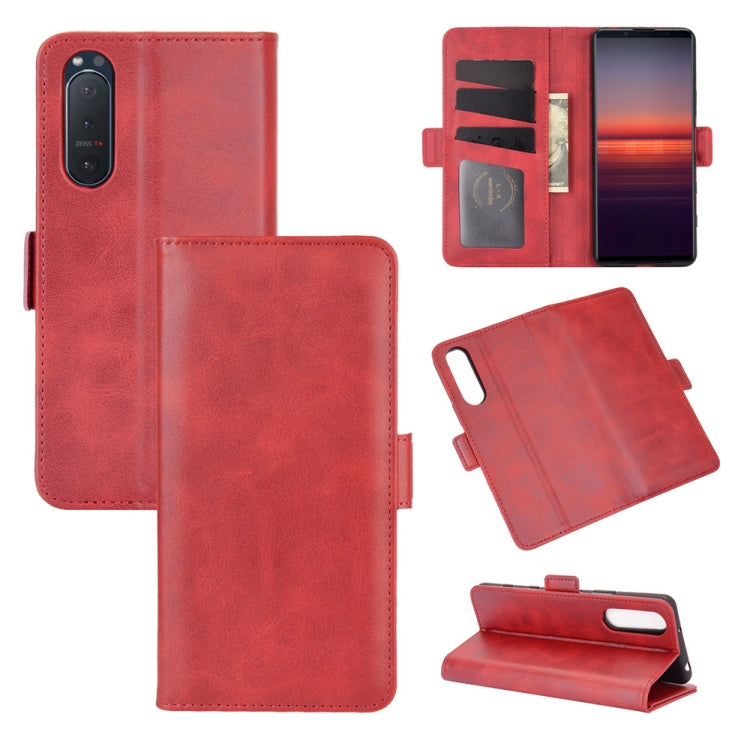 Red leather horizontal flip phone case with magnetic buckle, card holder and stand