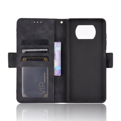 Black wallet phone case opened to card compartments and magnetic-style tab closure