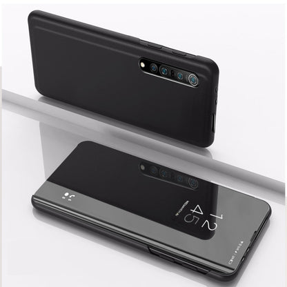 Black horizontal flip mirror leather phone case with camera cutout and stand