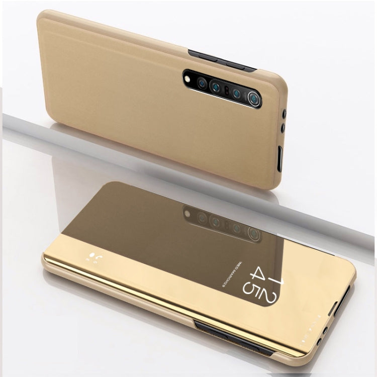 Gold leather phone case with horizontal flip, mirror window, and card holder
