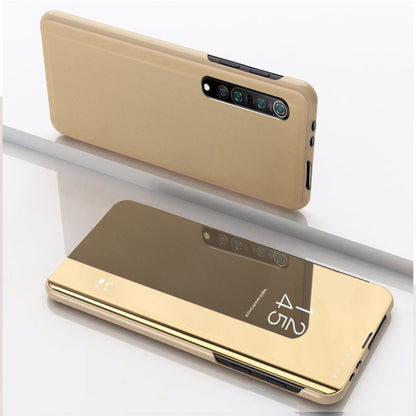 Gold leather phone case with horizontal flip, mirror window, and card holder