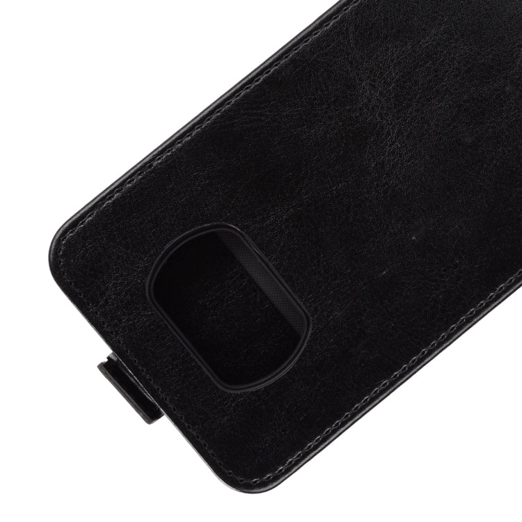 Black leather-style phone case corner with camera cutout and stitched edge
