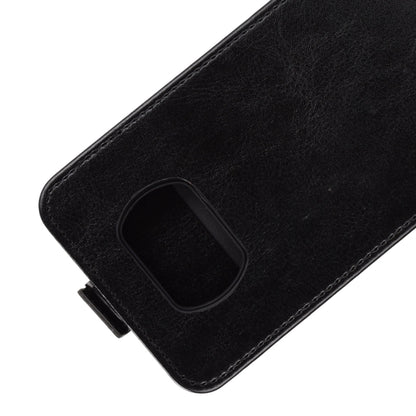 Black leather-style phone case corner with camera cutout and stitched edge
