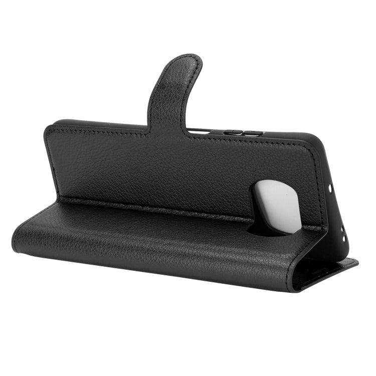 Black folio flip stand phone case with textured finish and cutout openings