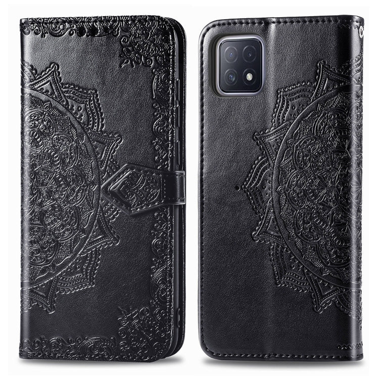 Black mandala embossed flip phone wallet case with magnetic strap and rear camera cutout