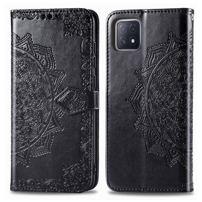 Black mandala embossed flip phone wallet case with magnetic strap and rear camera cutout