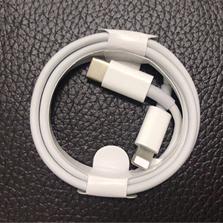 Close-up of white USB-C to 8-pin charging cable connectors