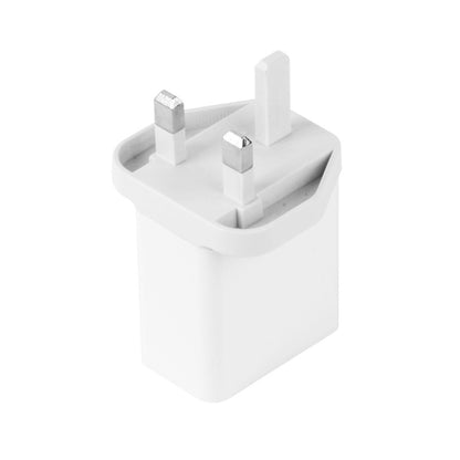 White UK plug wall charger block with two metal prongs and charger ports