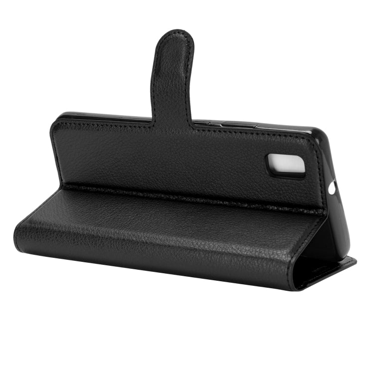 Black folio flip phone case with textured finish and flip stand for ZTE Blade L210