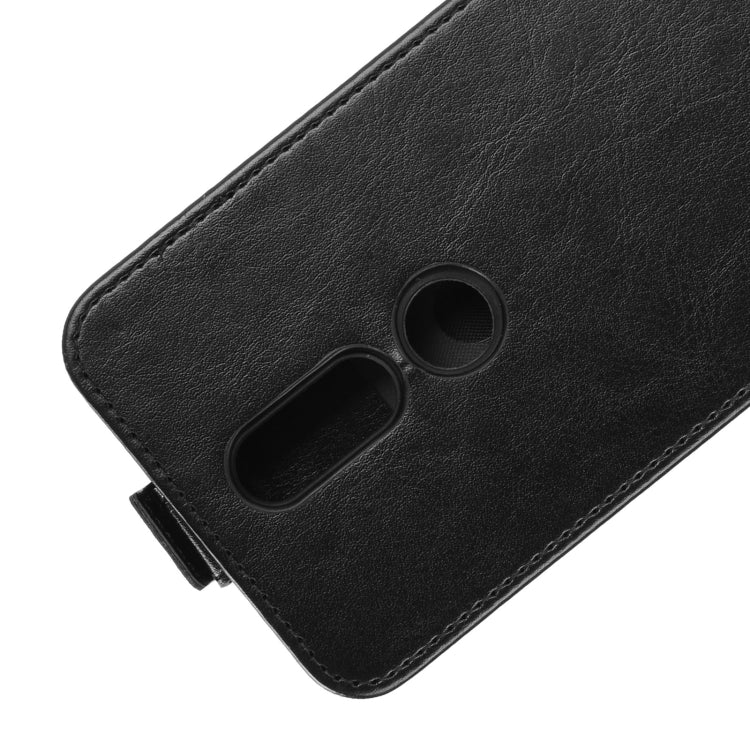 Black leather phone case with dual camera cutout and stitched edges, flip design