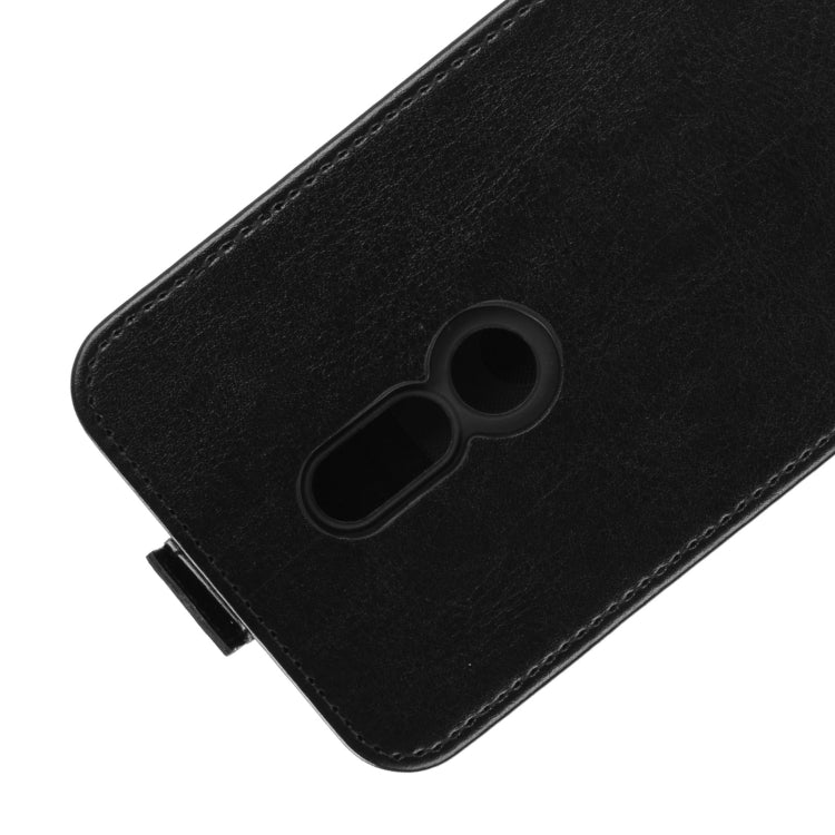 Black leather phone case with camera and speaker cutouts on back