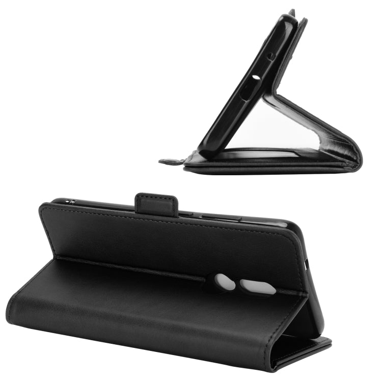 Black leather flip phone case with fold-out kickstand and magnetic closure