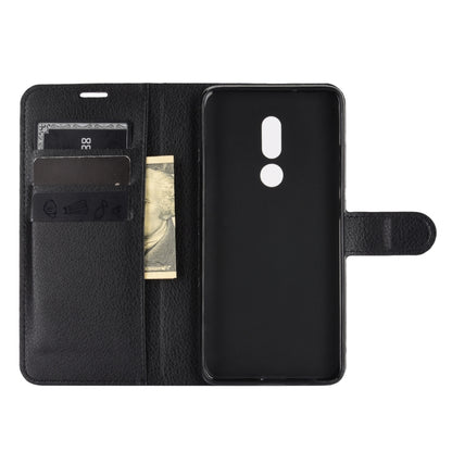 Black leather flip phone case with interior card slots and exposed camera area