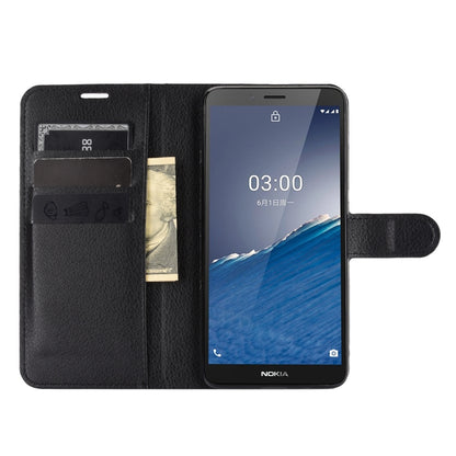 Black leather flip phone case with card slots and phone display
