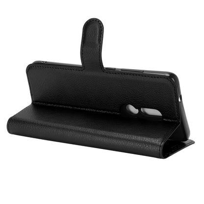 Black leather flip phone case with stand angle and side button cutout