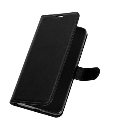 Black leather flip phone case with slim front cover and side strap holder