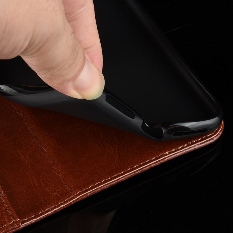 Brown leather-texture flip phone case close-up with stitched edge