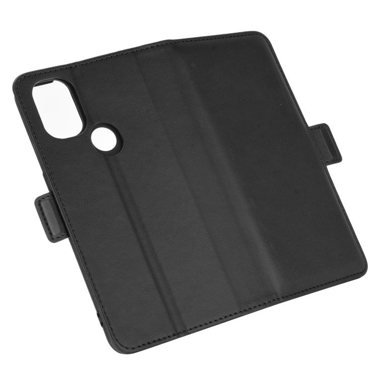 Black leather flip phone case back view with cutouts for camera and flash