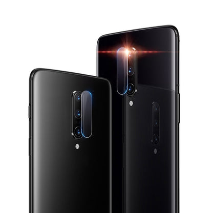 Transparent tempered glass rear camera lens film on two smartphone backs