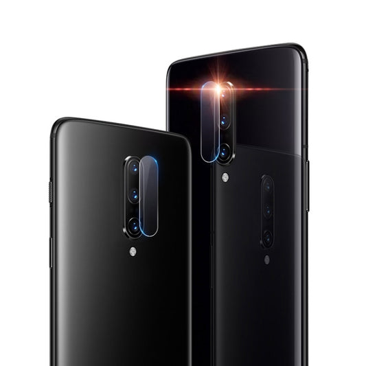 Transparent tempered glass rear camera lens film on two smartphone backs