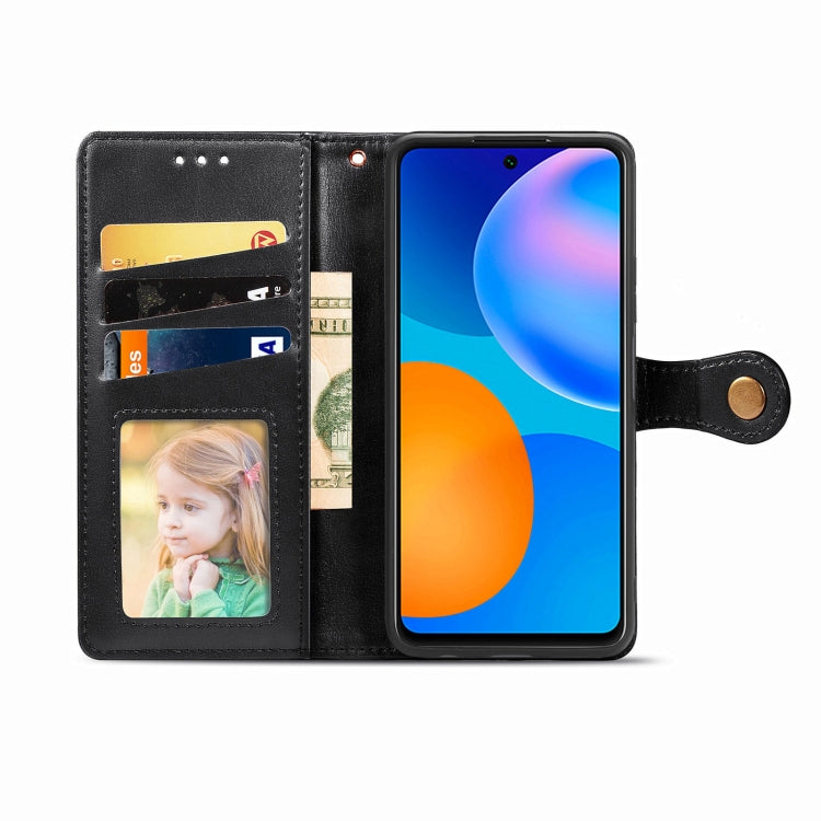 Black leather phone wallet case with photo window, card slots, and fold-out stand