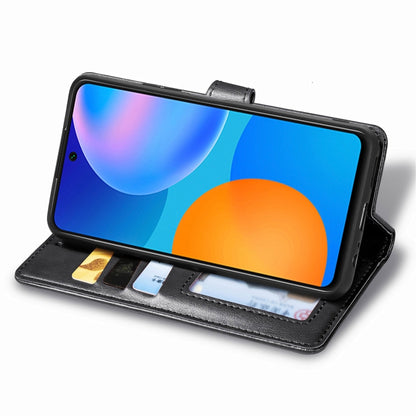 Black leather phone wallet case with card slot and fold-out stand for viewing