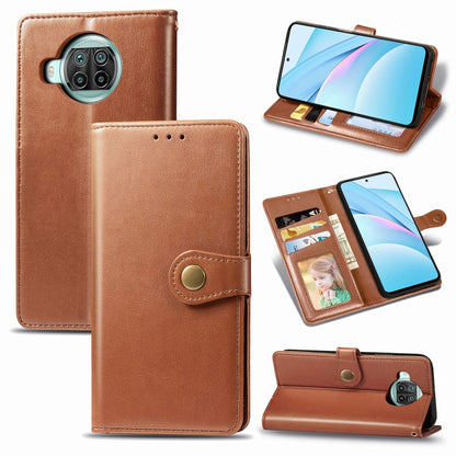 Brown leather phone wallet case with card slots, photo window, and stand function