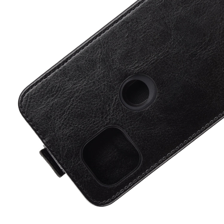 Black leather flip phone case corner detail with camera and speaker opening.