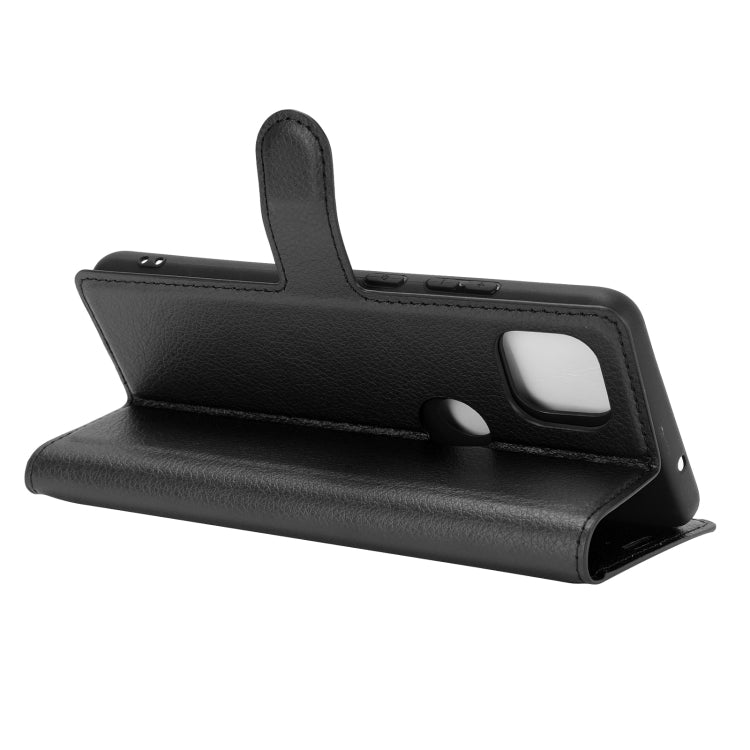 Black flip phone case with built-in stand, side access cutout, and smooth cover