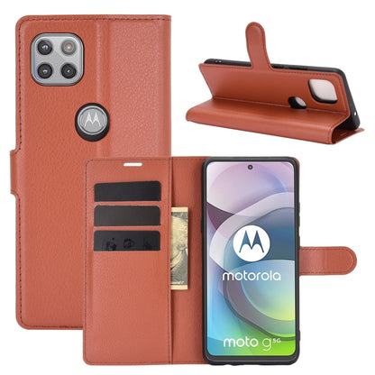 Brown litchi-texture flip phone case with wallet card slots and foldable stand