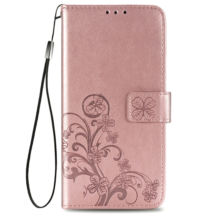 Rose gold leather folio phone case with floral embossing and lanyard strap
