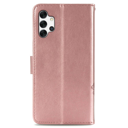 Rose gold leather phone case with camera cutouts and embossed floral design