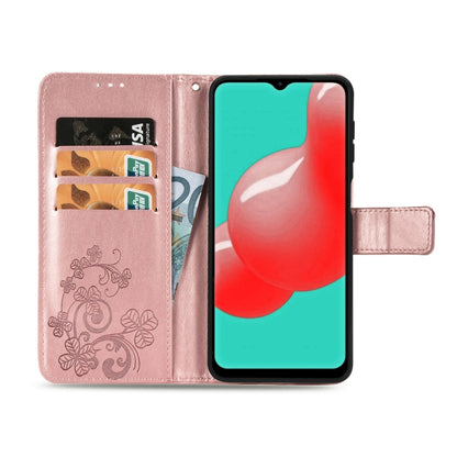 Rose gold leather wallet phone case with card slot, clasp, and floral embossing