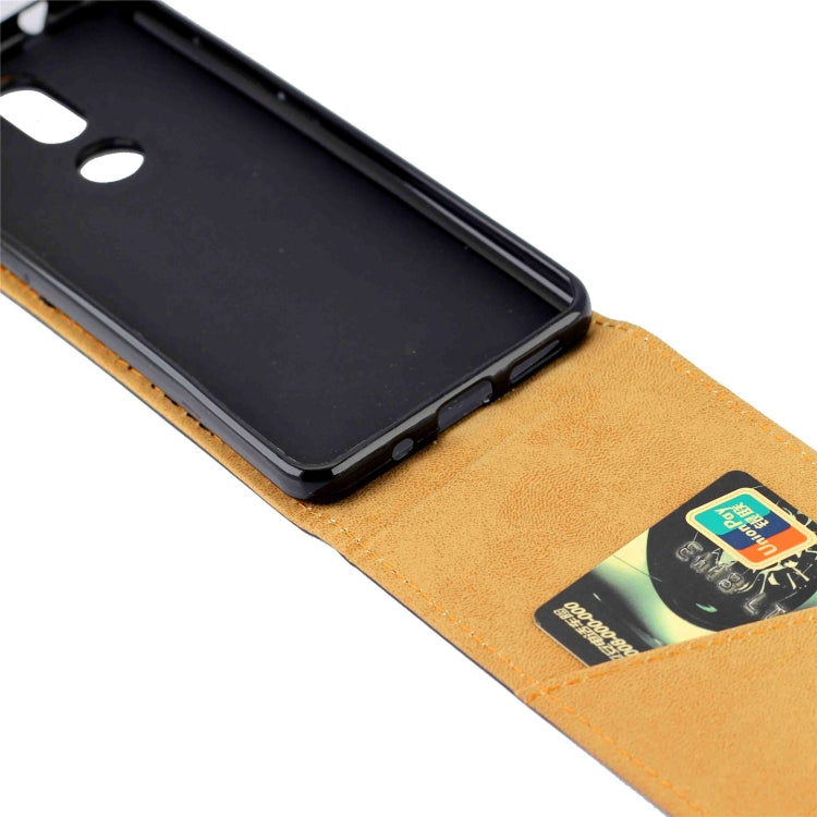Black TPU phone case with faux leather flap and card slot window, close-up