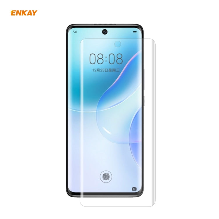 Curved transparent screen protector film aligned to a smartphone front