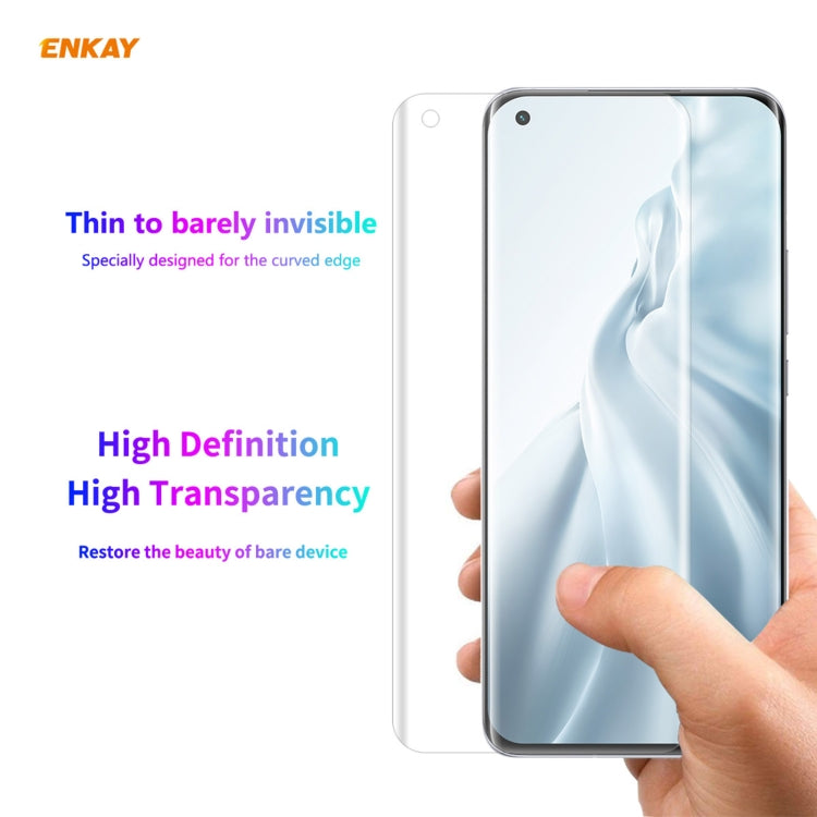 Thin curved PET screen protector film with high transparency, applied over smartphone screen