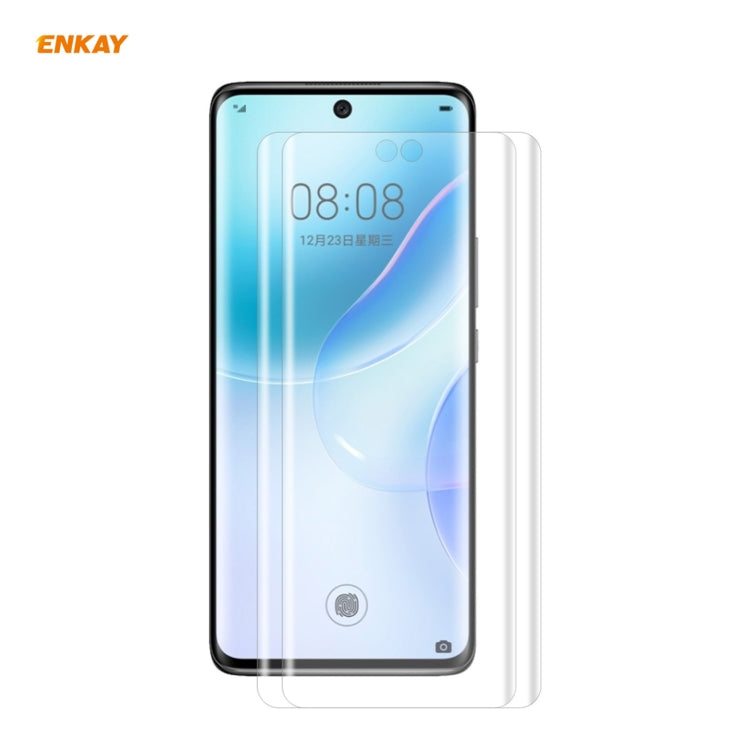Curved PET screen protector film set applied on a dark-framed smartphone display