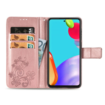 Rose gold leather wallet phone case with floral emboss, card slots, and viewing stand