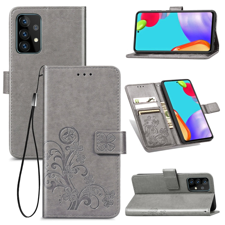 Gray leather wallet phone case with floral emboss, lanyard, card slots, and stand