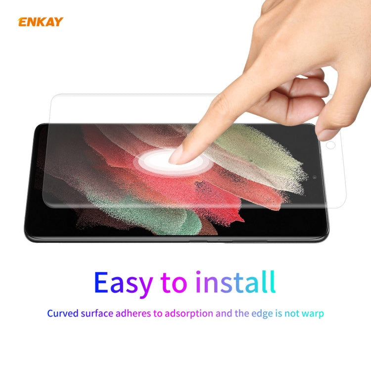 Transparent screen protector film for Galaxy S21 Ultra, hand pressing to apply