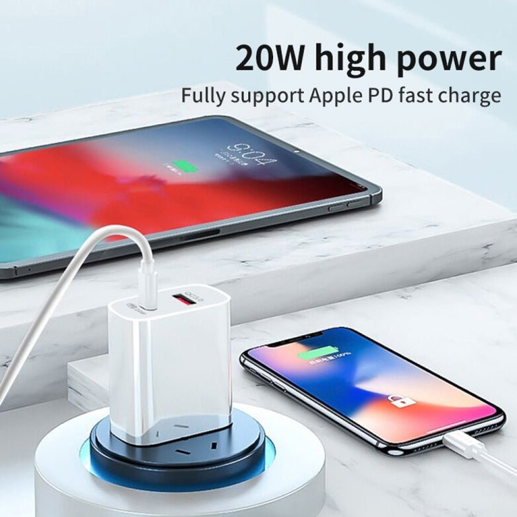 White UK plug dual USB fast charger powering a smartphone and tablet